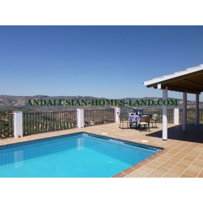  BEAUTIFULLY COUNTRY PROPERTY WITH A FANTASTIC POOL AREA AND THE MOST AMAZING VIEWS